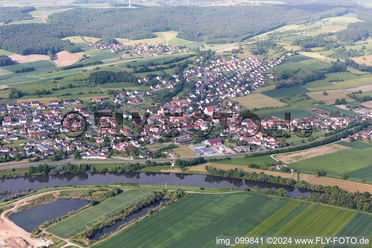 Aerial view of Village on the river bank areas of the Main river in Viereth-Trunstadt in the state Bavaria, Germany