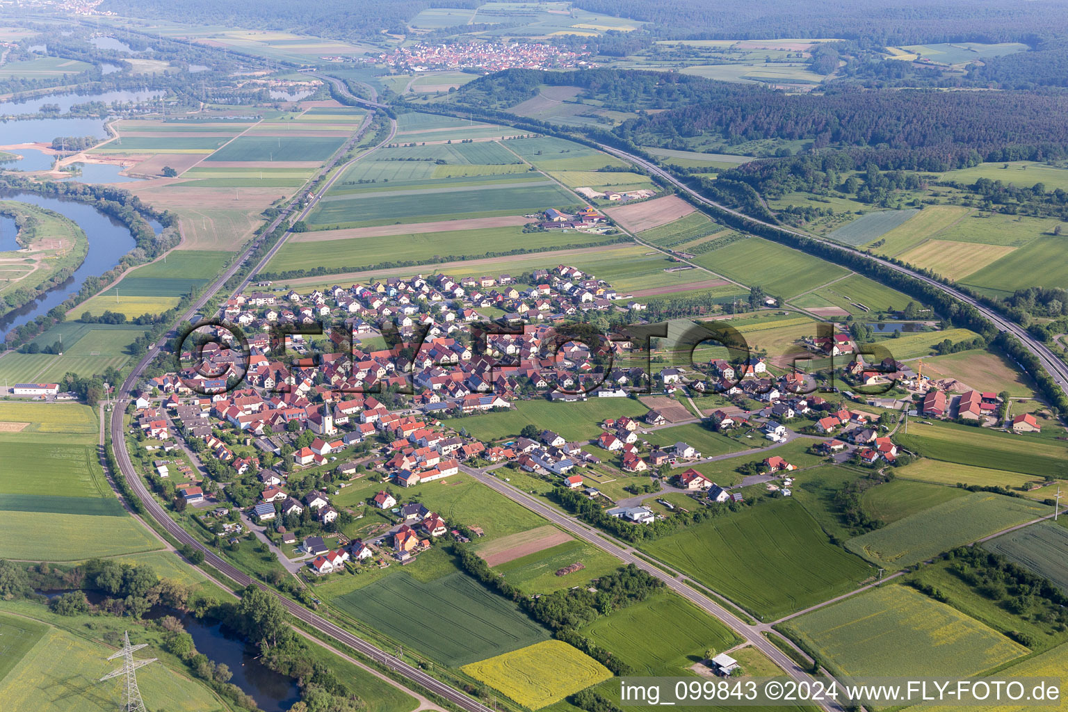 Aerial view of Village on the river bank areas of the Main river in the district Staffelbach in Oberhaid in the state Bavaria, Germany