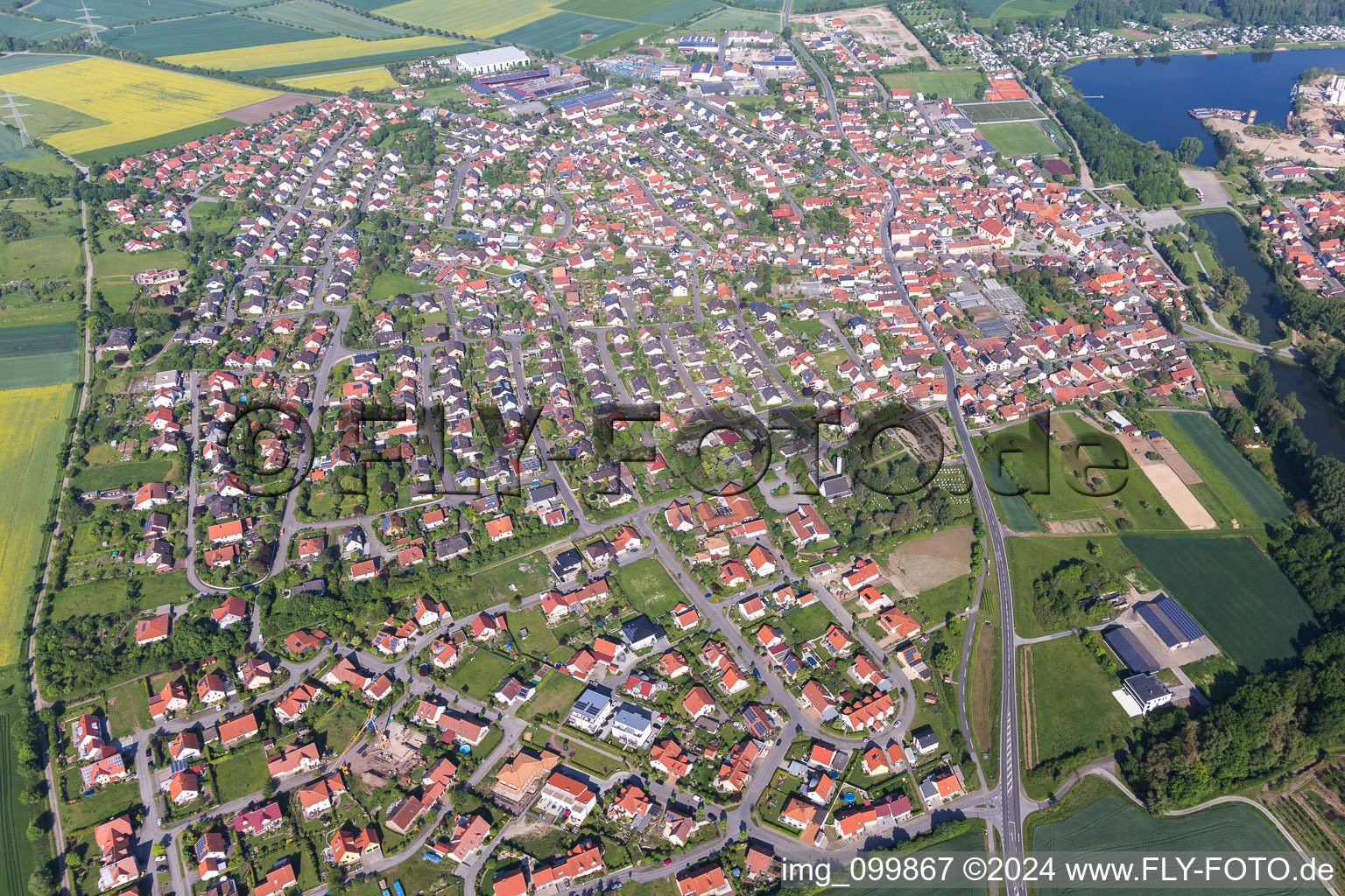 Oblique view of Town on the banks of the river of the Main river in Sand am Main in the state Bavaria, Germany