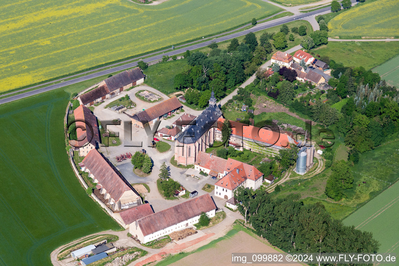 Aerial view of Buildings and parks at the mansion of the farmhouse mariaburghausen in Hassfurt in the state Bavaria, Germany