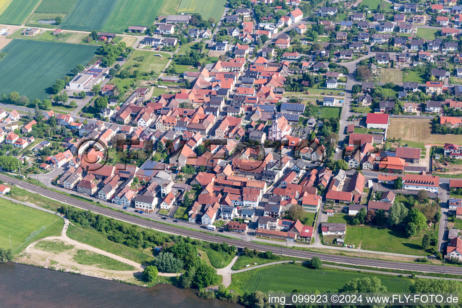 Aerial view of Village on the river bank areas of the Main river in Untertheres in the state Bavaria, Germany