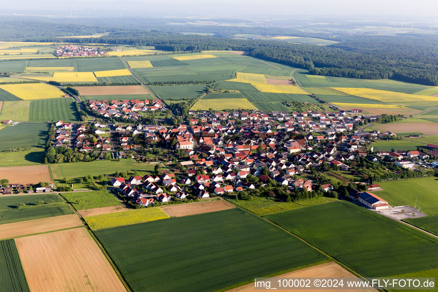 From the southeast in the district Hesselbach in Üchtelhausen in the state Bavaria, Germany