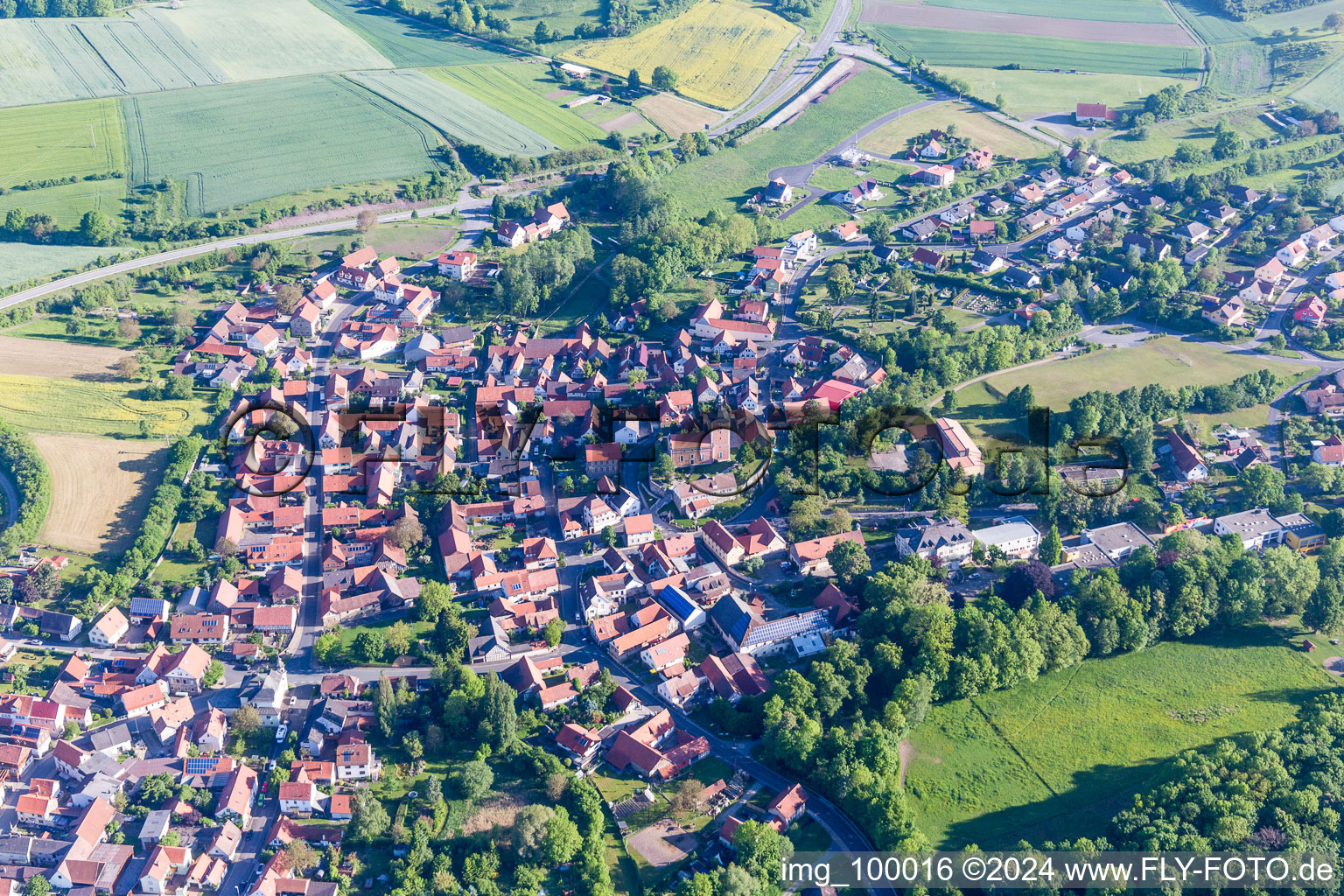 Aerial view of Town View of the streets and houses of the residential areas in the district Oberlauringen in Stadtlauringen in the state Bavaria, Germany