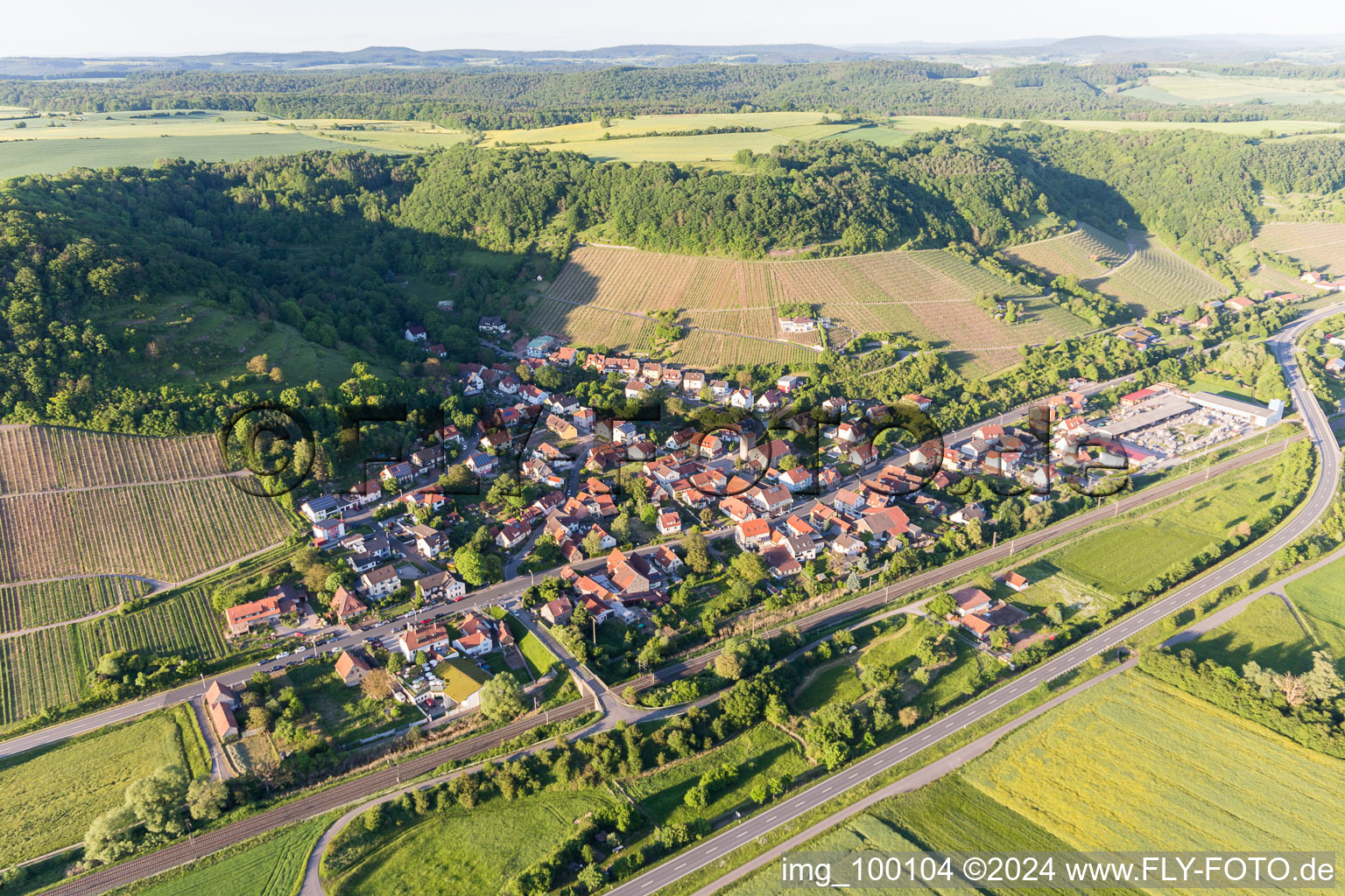 Village - view on the edge of agricultural fields and farmland in Ziegelanger in the state Bavaria, Germany