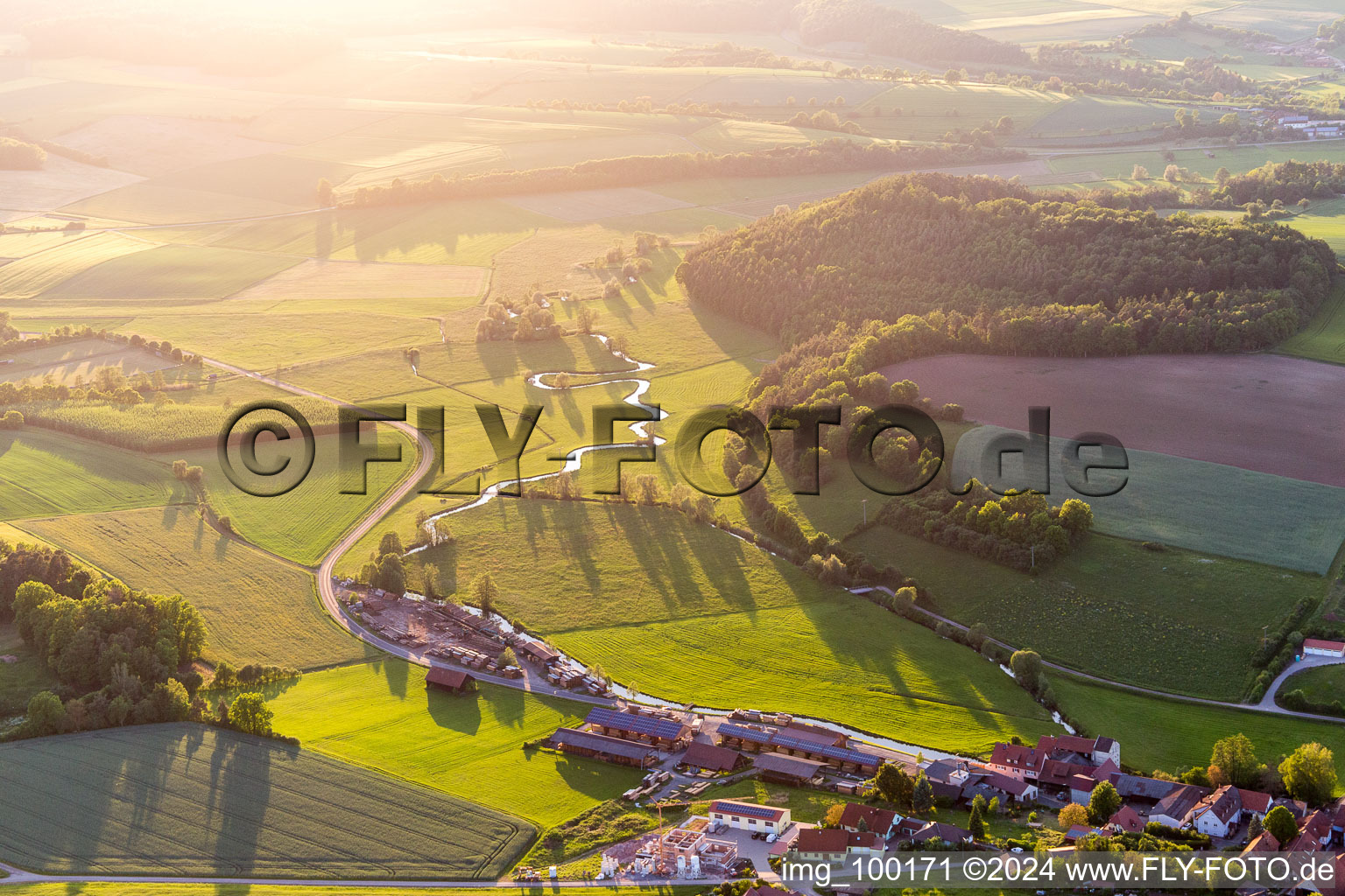 Meandering, serpentine curve of a river Baunach in Ebern in the state Bavaria, Germany