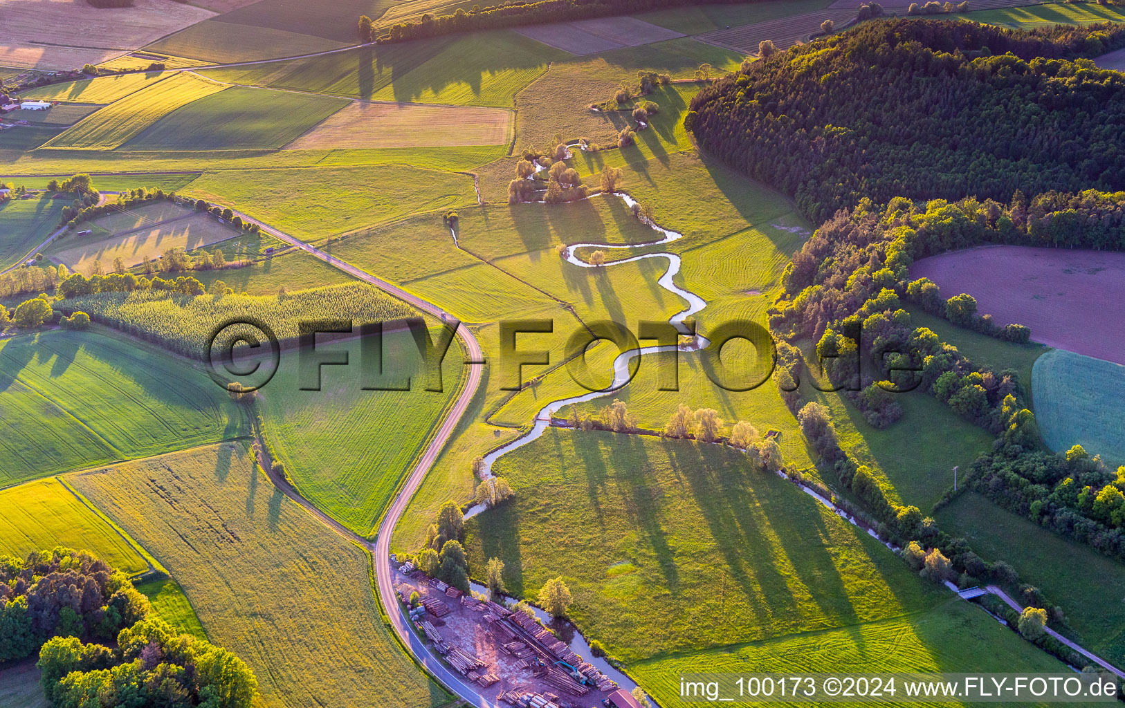 Meandering, serpentine curve of a river Baunach in Ebern in the state Bavaria, Germany