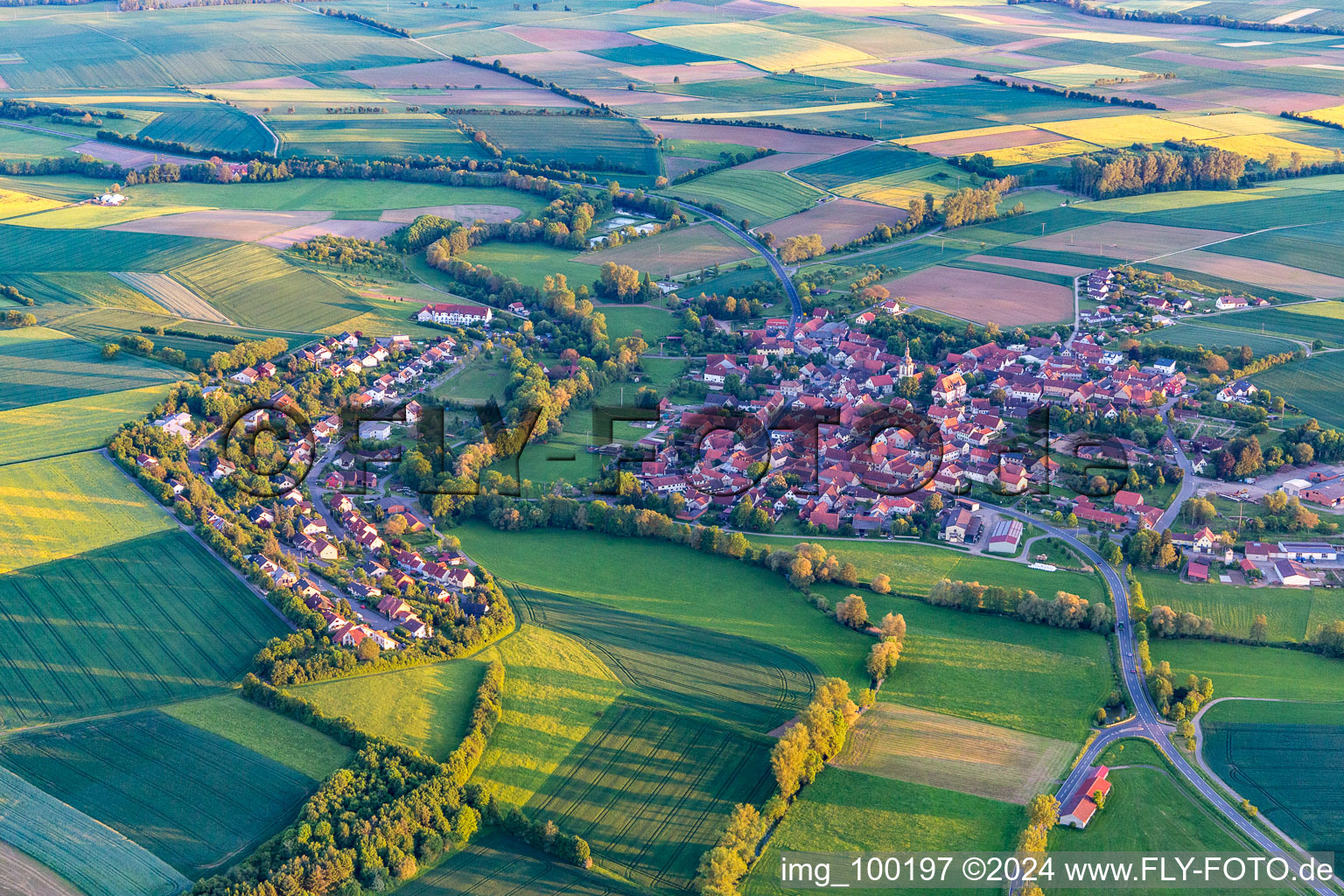 From the north in the district Rügheim in Hofheim in Unterfranken in the state Bavaria, Germany