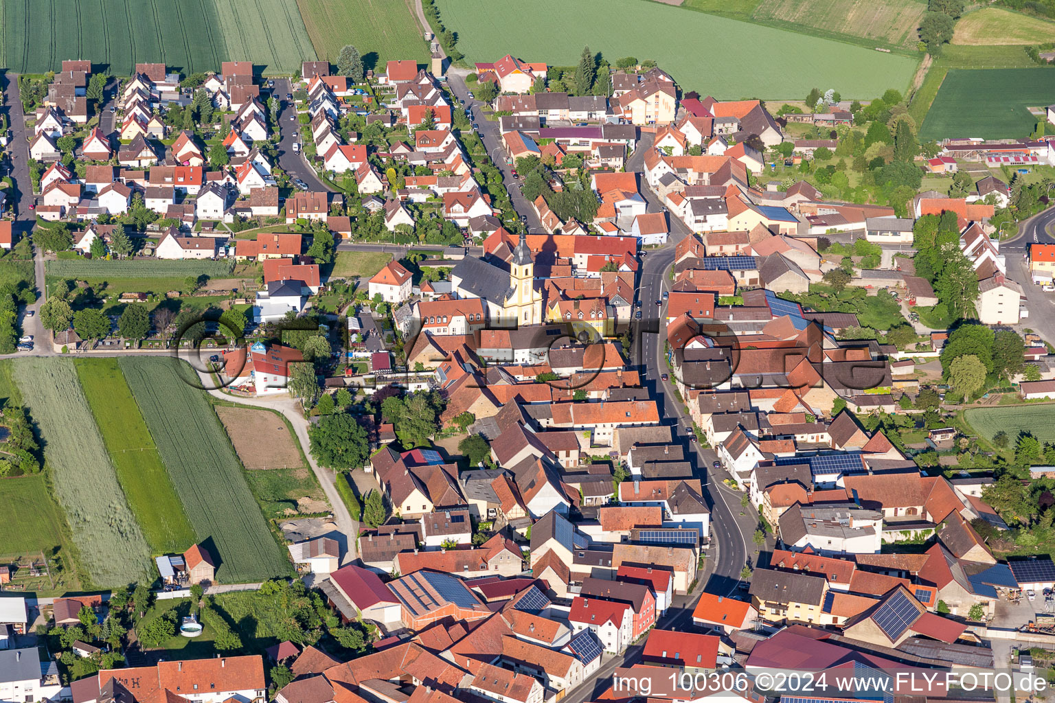 Aerial view of Town View of the streets and houses of the residential areas in Unterspiesheim in the state Bavaria, Germany