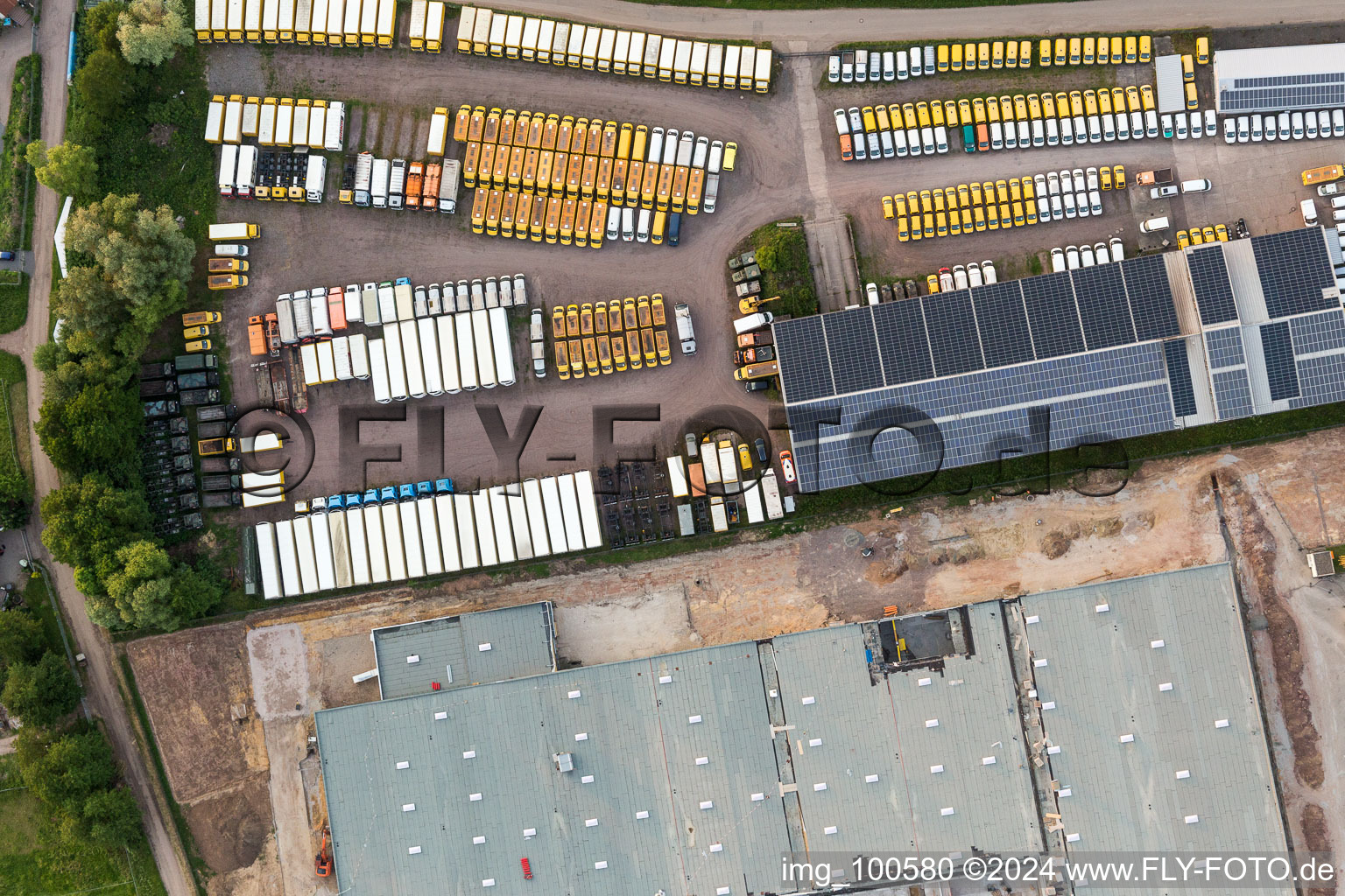 Aerial view of Industrial estate and company settlement Sued with Engel & Engel GmbH DHL-Paket-Transporter-Verwertung in Rohrbach in the state Rhineland-Palatinate, Germany