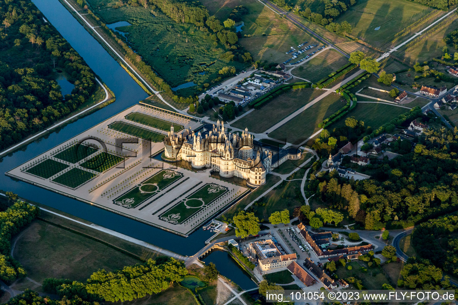 Chateau de Chambord with castle park and Cosson canal in Chambord in the state Loir et Cher, France