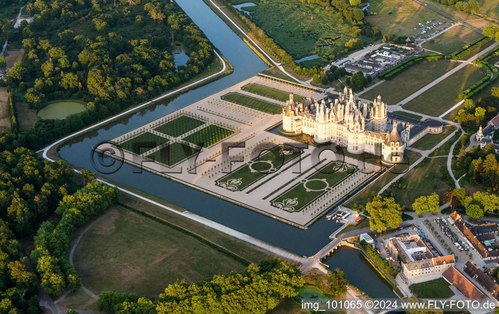 Aerial view of Channels and Building complex in the park of the castle Schloss Chambord in Chambord in Centre-Val de Loire, France