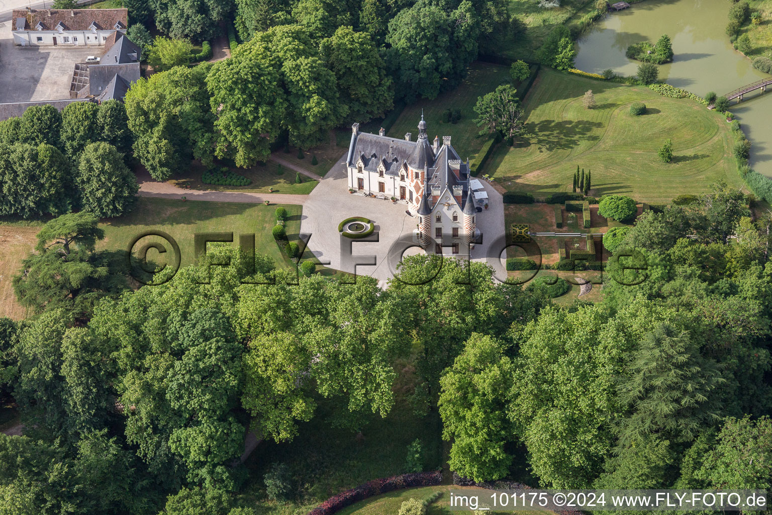 Aerial view of Buildings and park of the castle in Saint-Cyr-du-Gault in Centre-Val de Loire, France