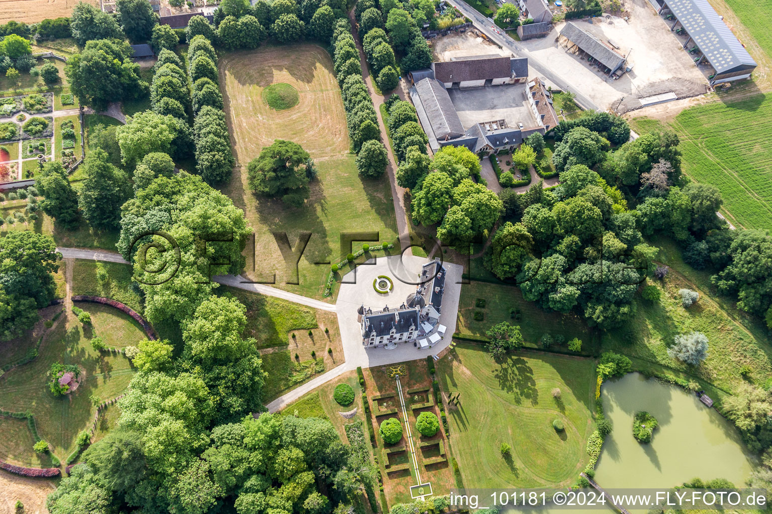 Aerial view of Building complex in the park of the castle Saint-Cyr-du-Gault in Saint-Cyr-du-Gault in Centre-Val de Loire, France