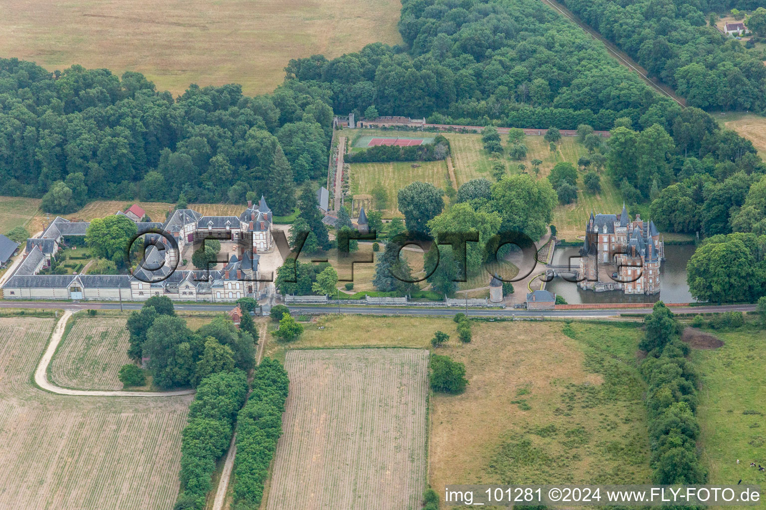 Aerial photograpy of Building and castle park systems of water castle Chateau de Combreux in Combreux in Centre-Val de Loire, France