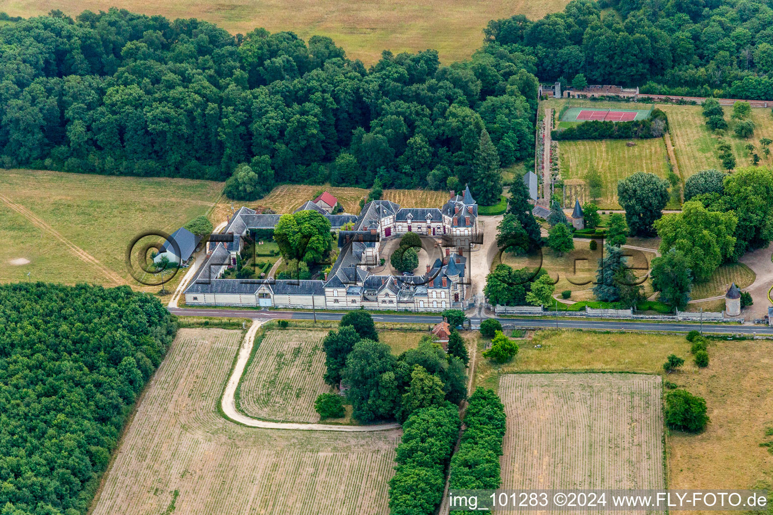 Building and castle park systems of water castle Chateau de Combreux in Combreux in Centre-Val de Loire, France from above