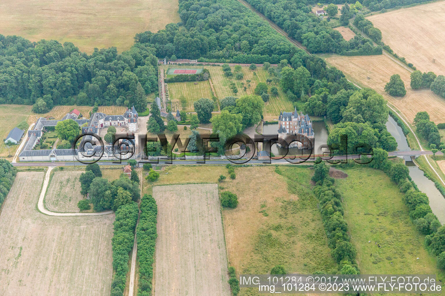Building and castle park systems of water castle Chateau de Combreux in Combreux in Centre-Val de Loire, France out of the air
