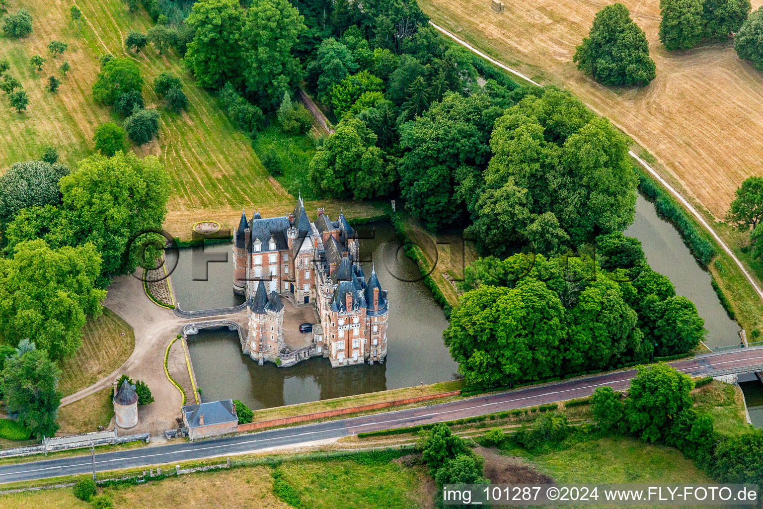 Bird's eye view of Building and castle park systems of water castle Chateau de Combreux in Combreux in Centre-Val de Loire, France