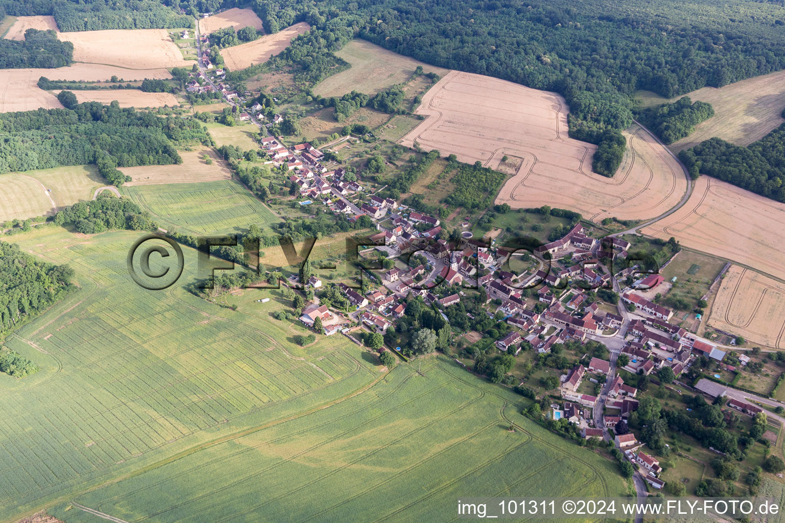 Village - view on the edge of agricultural fields and farmland in Bellechaume in Bourgogne Franche-Comte, France