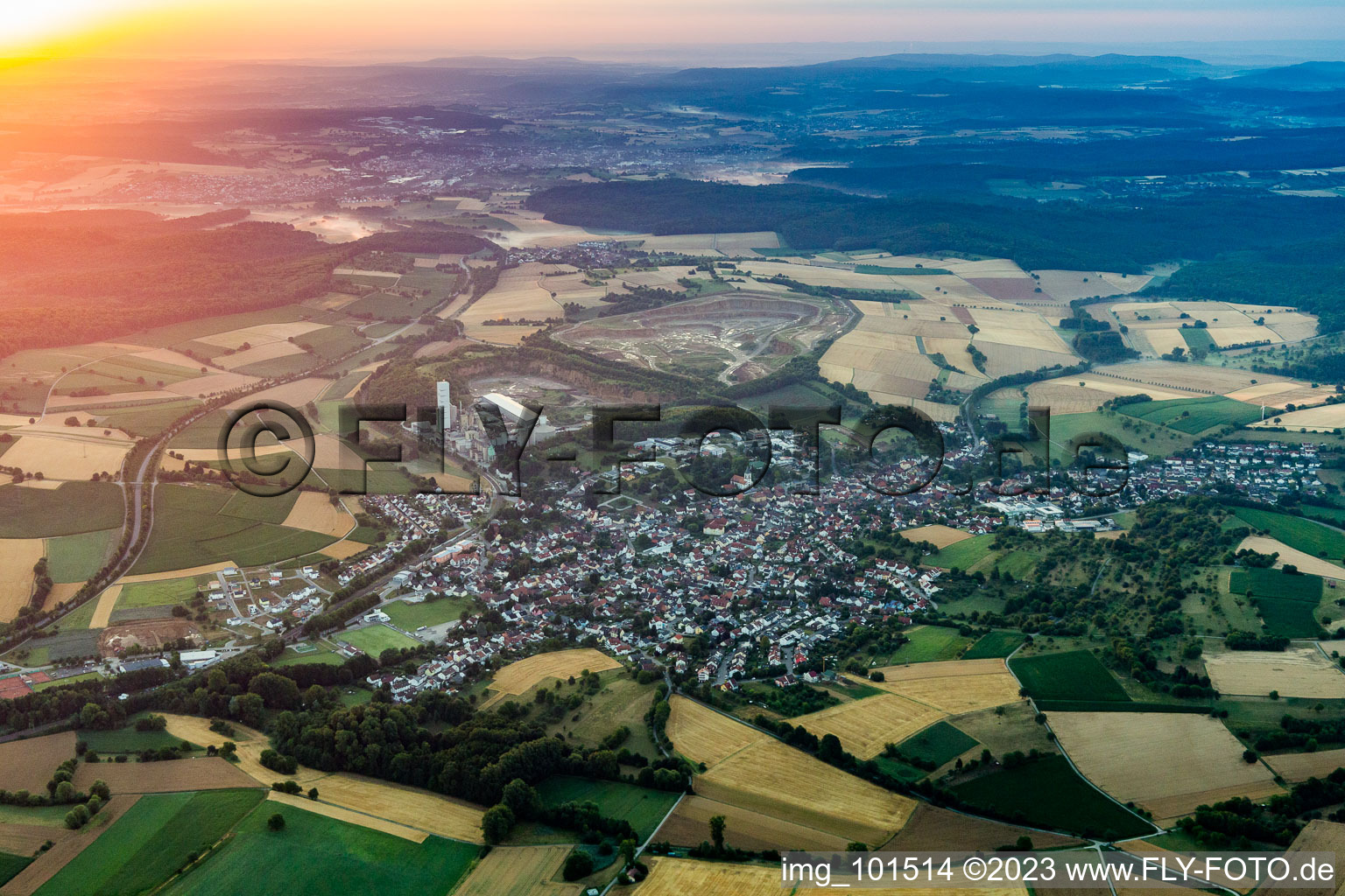 Village - view on the edge of agricultural fields and farmland in Woessingen in the state Baden-Wurttemberg, Germany