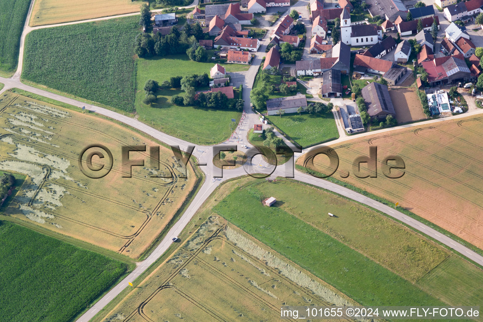 Village - view on the edge of agricultural fields and farmland in Moenchsdeggingen in the state Bavaria, Germany