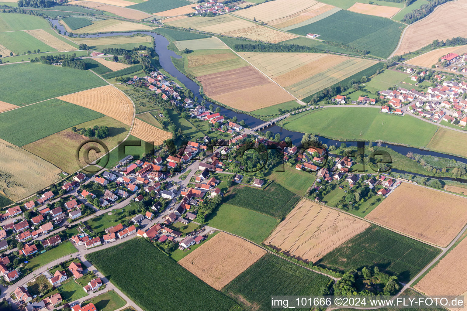 Aerial view of Village on the river bank areas of Woernitz in Woernitzstein in the state Bavaria, Germany