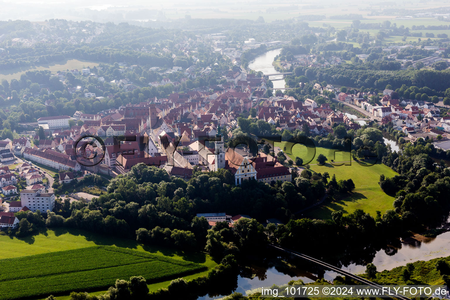 Complex of buildings of the monastery Heilig Kreuz in front of Ried island in Donauwoerth in the state Bavaria, Germany