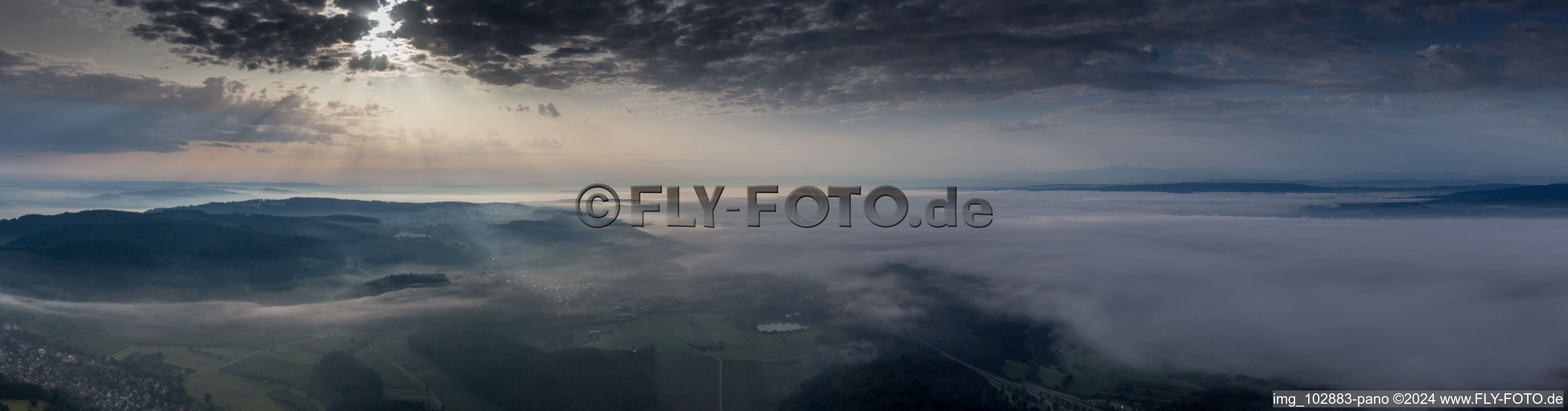 Panorama perspective of ground-fog formation at sunrise on lake of Constance in the district Stahringen in Radolfzell am Bodensee in the state Baden-Wurttemberg, Germany