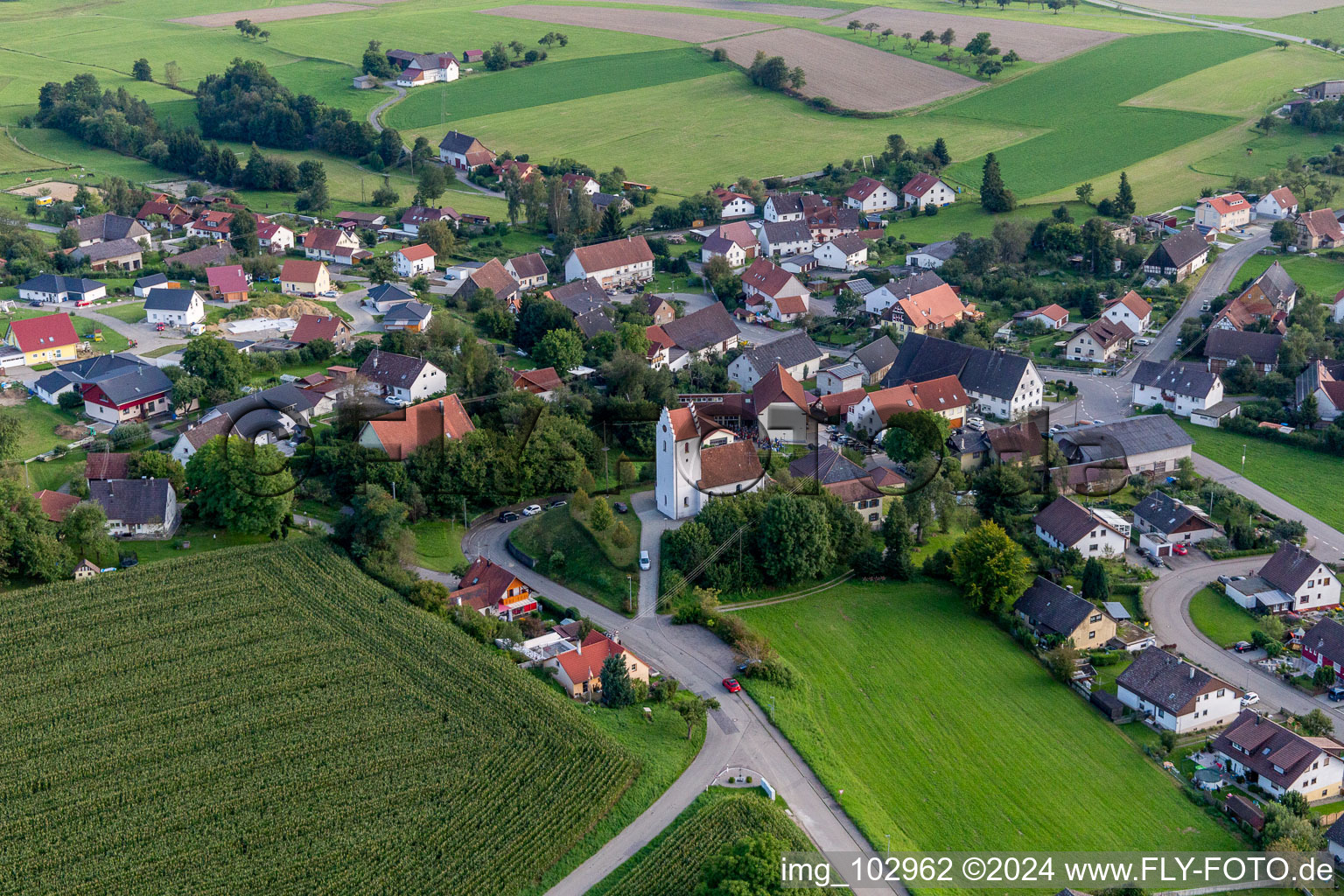 Aerial view of Village - view on the edge of agricultural fields and farmland in Sentenhart in the state Baden-Wurttemberg, Germany