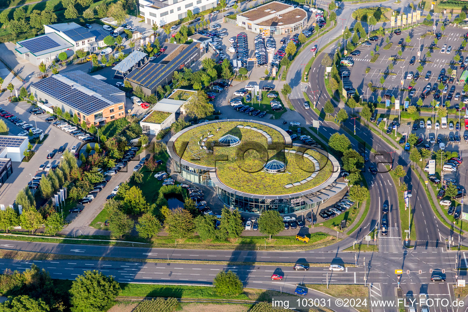 Eight-shaped car dealership building Autohaus Ebert GmbH & Co. KG in Weinheim in the state Baden-Wurttemberg, Germany