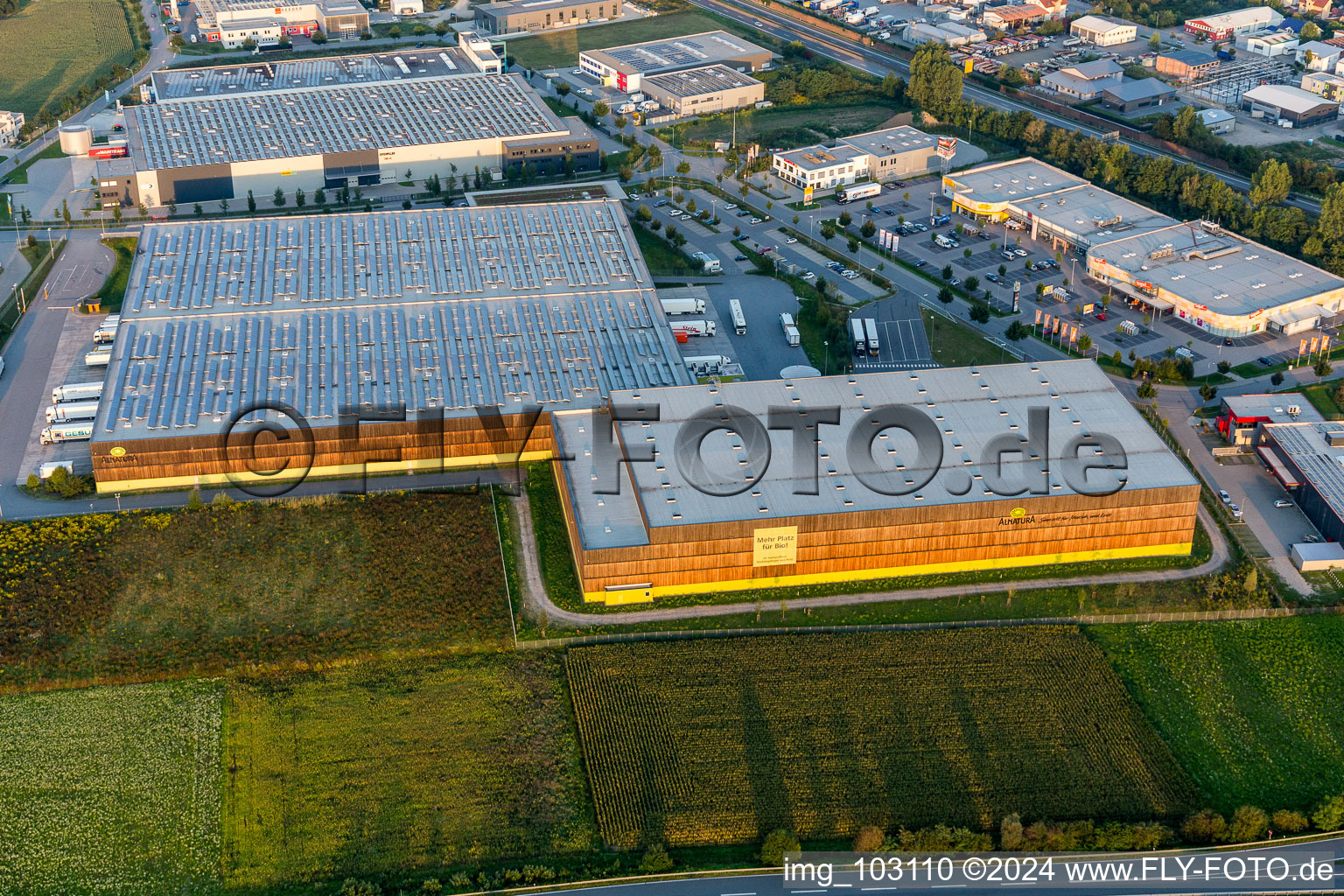 Oblique view of Building complex and grounds of the logistics center of Verteilzentrums von Alnatura in Lorsch in the state Hesse, Germany
