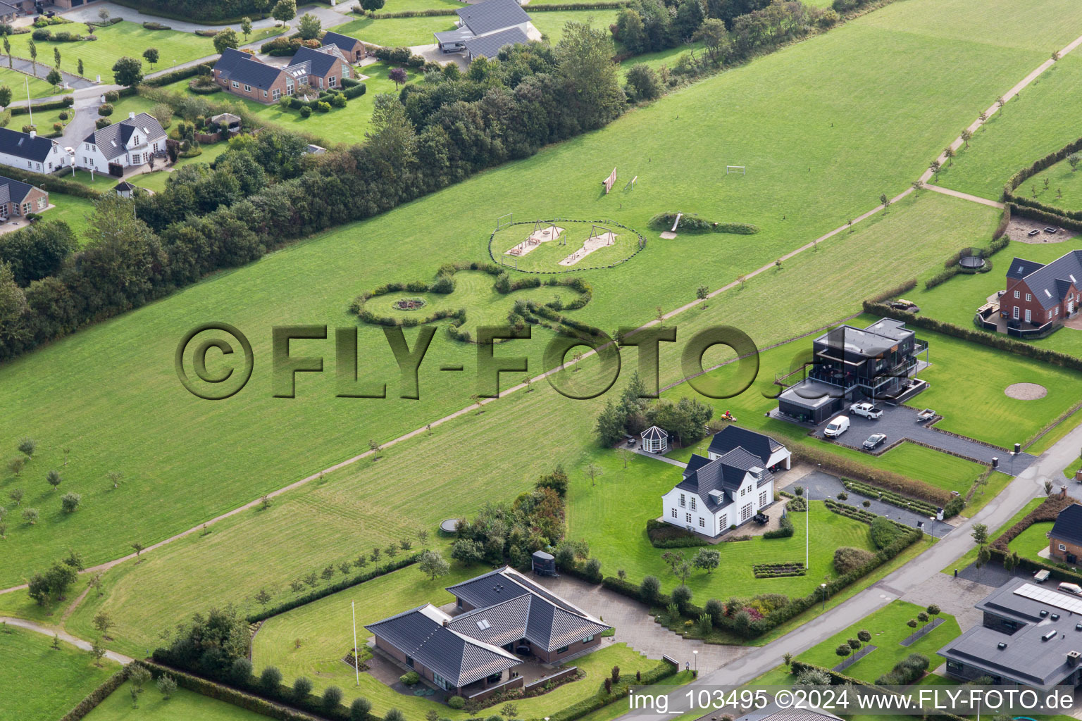 Oblique view of Luxury villas in residential area of single-family settlement in Varde in Juetland, Denmark