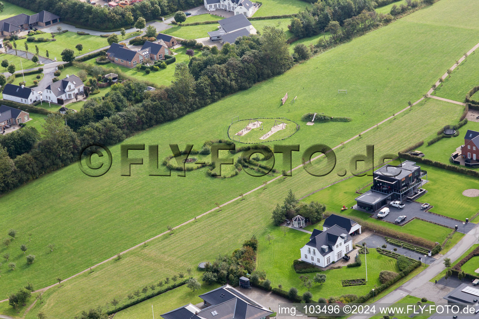 Luxury villas in residential area of single-family settlement in Varde in Juetland, Denmark from above