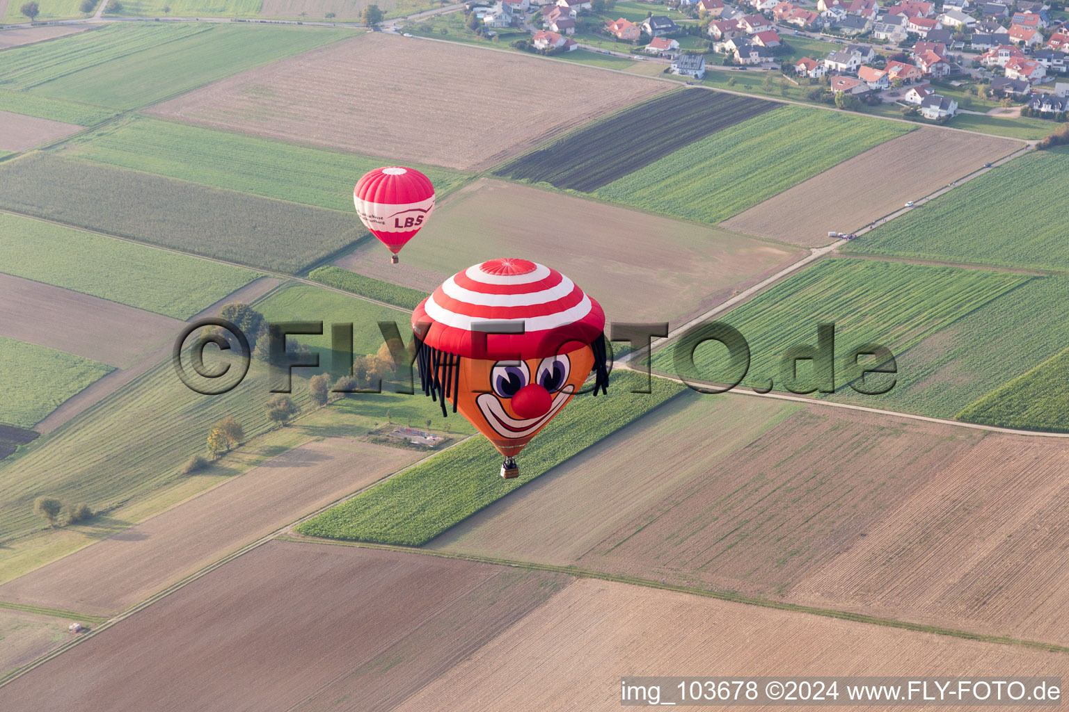 Hot air balloon with hat face in the district Bauschlott in Neulingen in the state Baden-Wuerttemberg, Germany