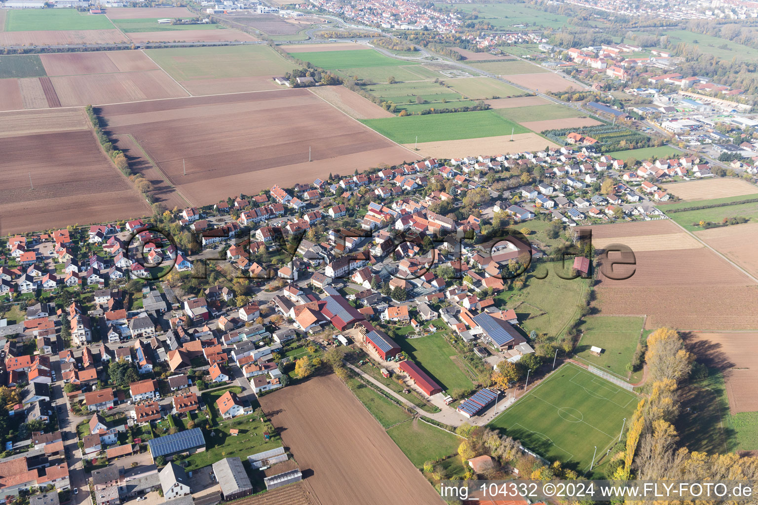 Village - view on the edge of agricultural fields and farmland in the district Moerlheim in Landau in der Pfalz in the state Rhineland-Palatinate, Germany