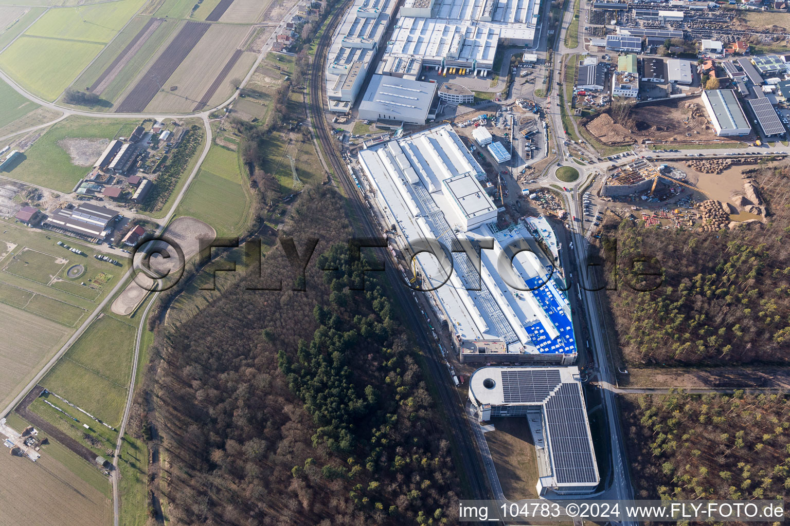 Aerial view of Extension - new building - construction site on the factory premises of SEW-EURODRIVE GmbH & Co KG in Graben-Neudorf in the state Baden-Wurttemberg, Germany