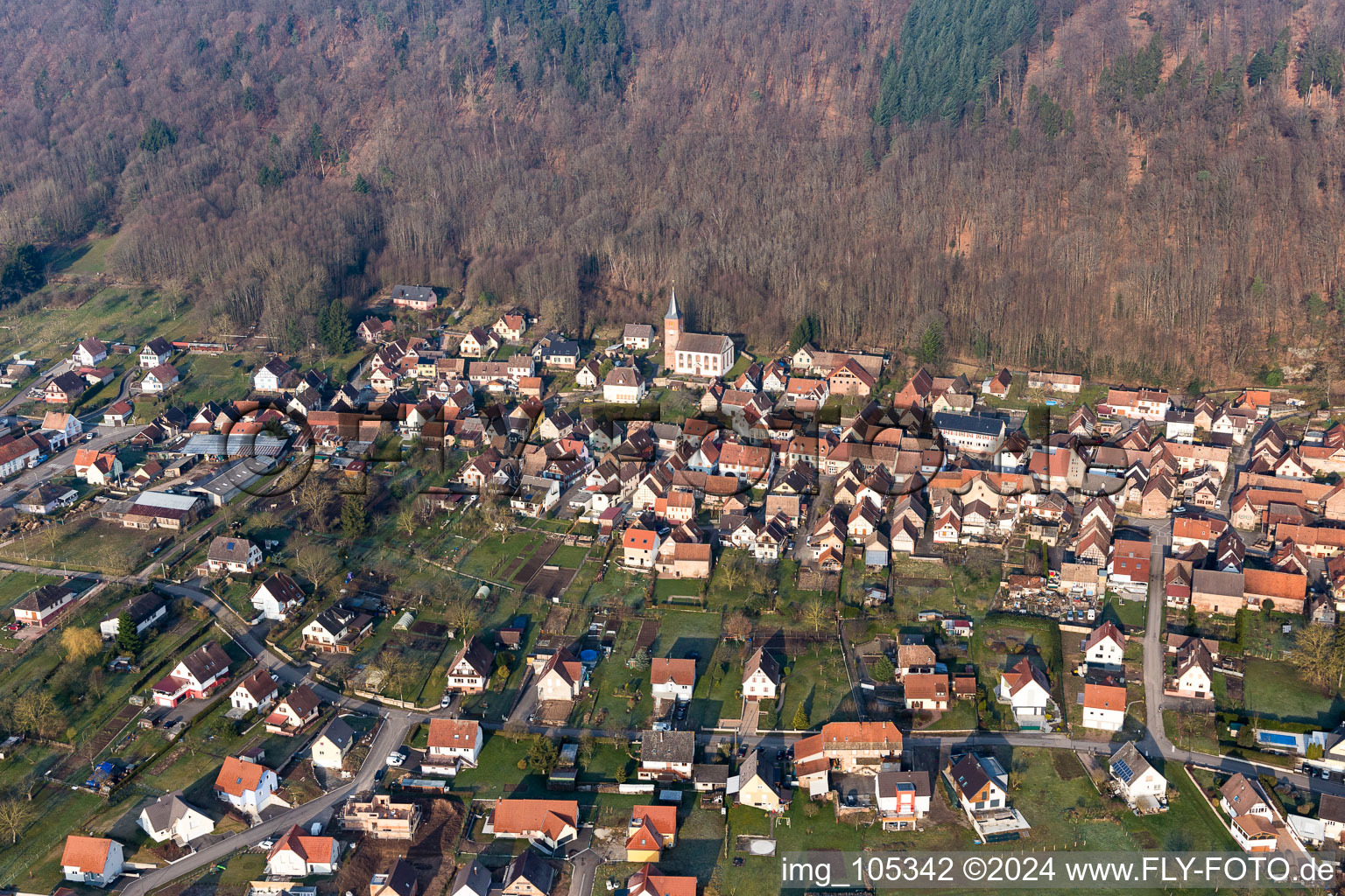 Village - view on the edge of agricultural fields and farmland in Ernolsheim-les-Saverne in Grand Est, France