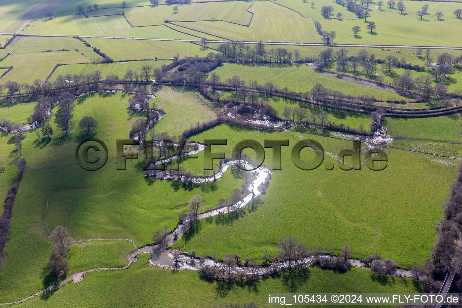 Meandering, serpentine curve of a river in Sully in Bourgogne-Franche-Comte, France