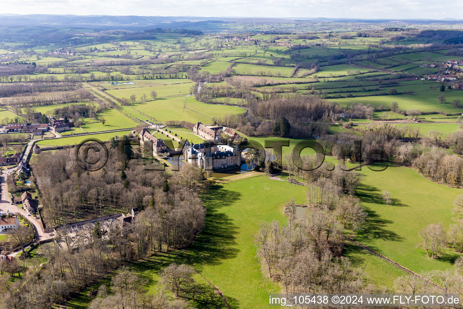 Aerial view of Water castle Château Sully in Burgundy in Sully in the state Saone et Loire, France