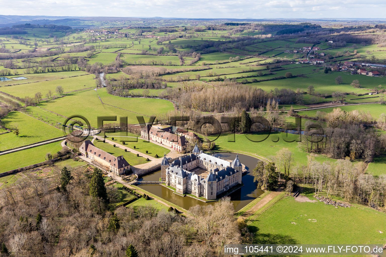 Aerial view of Building and castle park systems of water castle Sully in Sully in Bourgogne-Franche-Comte, France