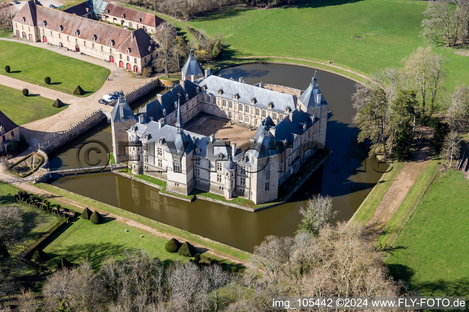 Aerial photograpy of Building and castle park systems of water castle Sully in Sully in Bourgogne-Franche-Comte, France