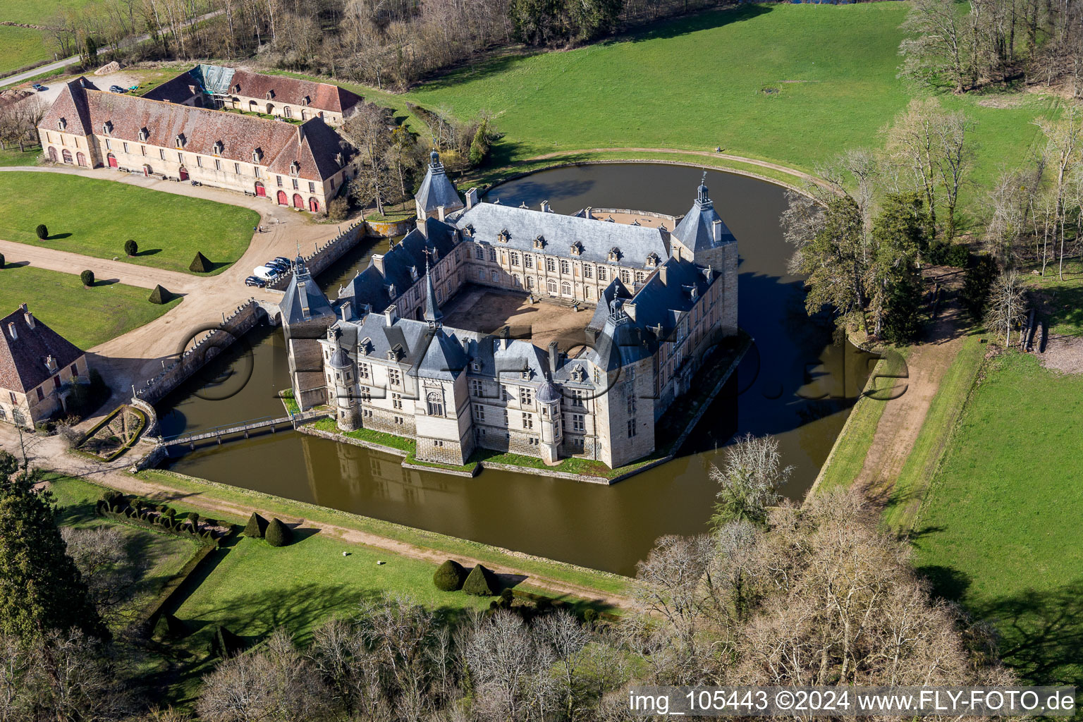 Aerial photograpy of Water castle Château Sully in Burgundy in Sully in the state Saone et Loire, France