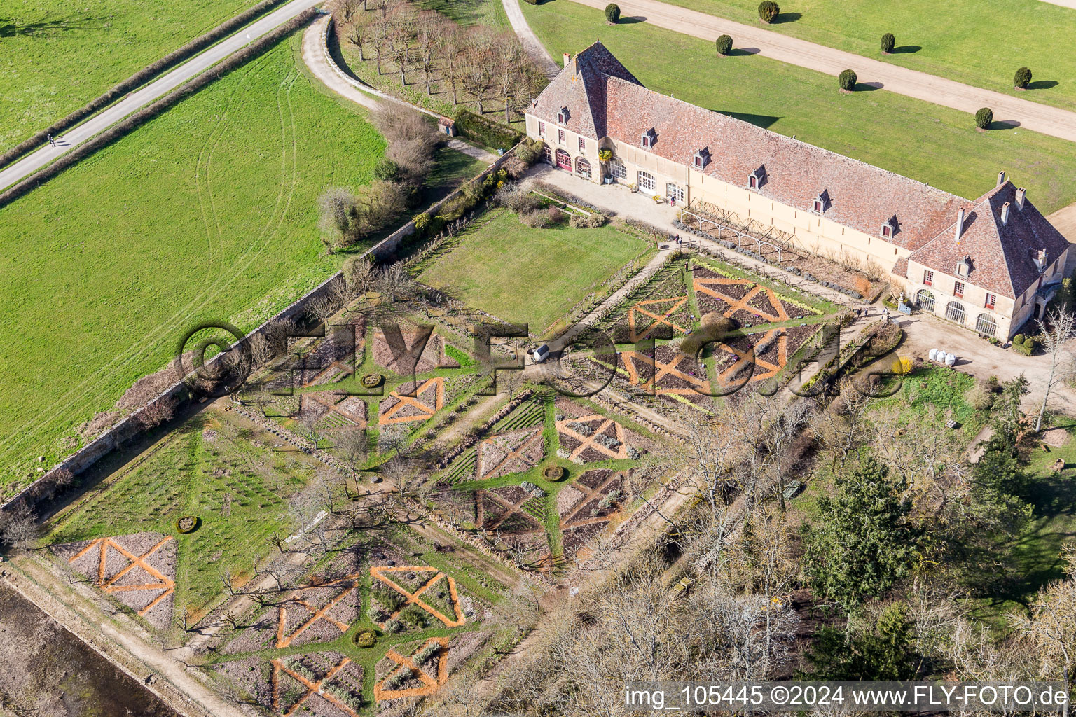 Oblique view of Water castle Château Sully in Burgundy in Sully in the state Saone et Loire, France