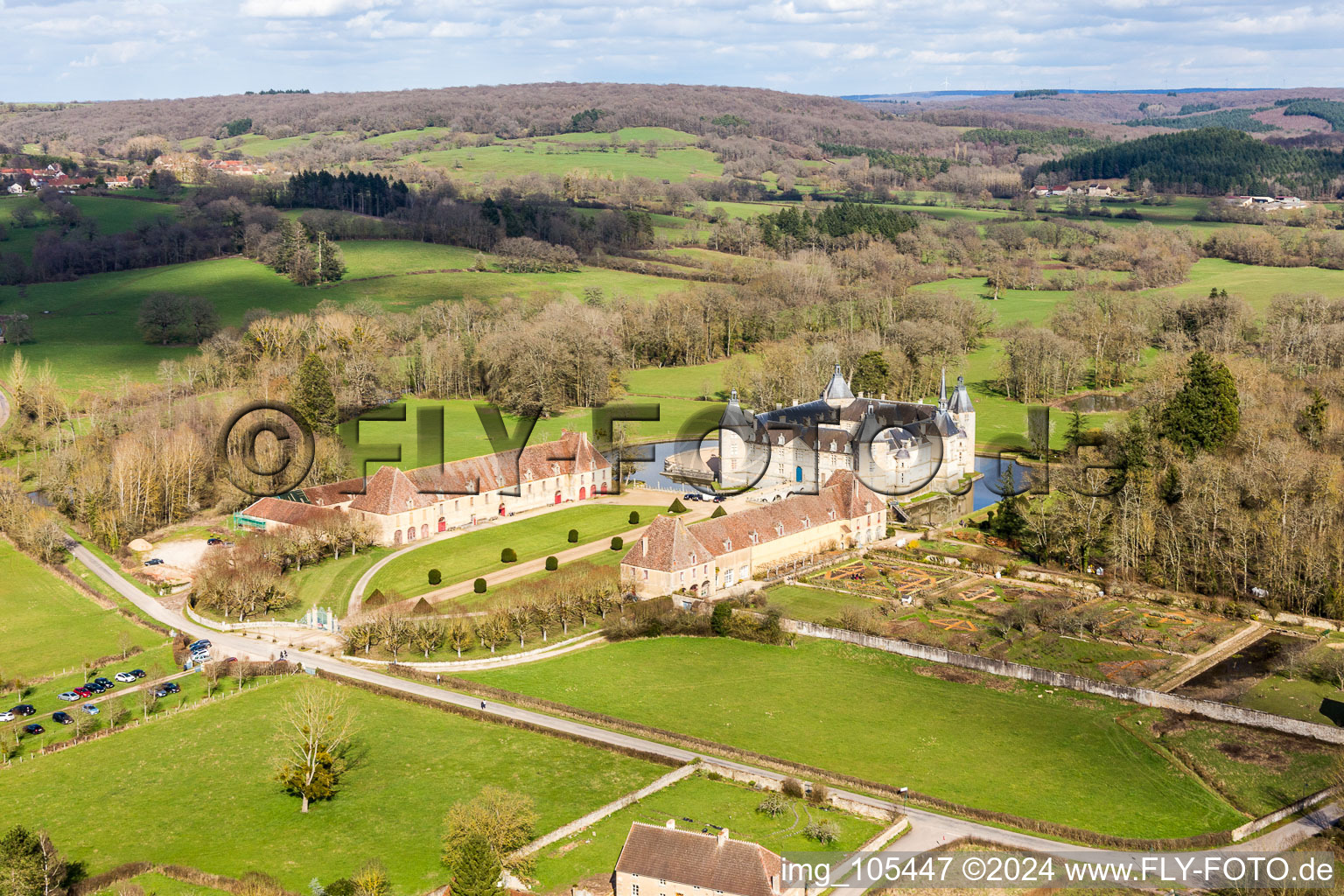 Water castle Château Sully in Burgundy in Sully in the state Saone et Loire, France out of the air