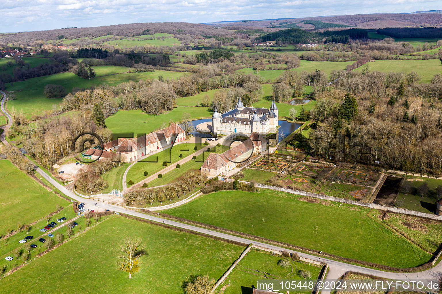 Water castle Château Sully in Burgundy in Sully in the state Saone et Loire, France seen from above