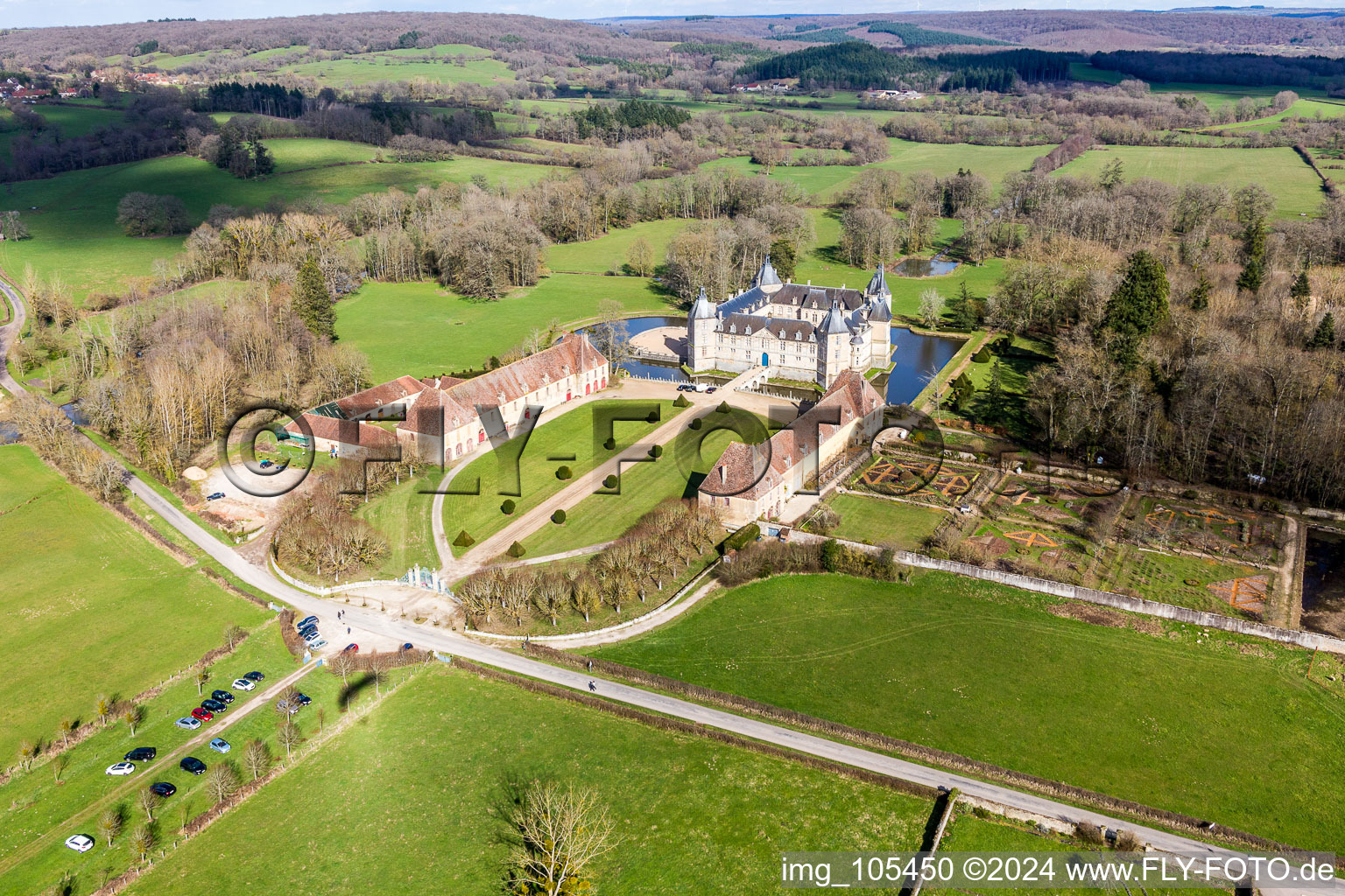 Water castle Château Sully in Burgundy in Sully in the state Saone et Loire, France from the plane