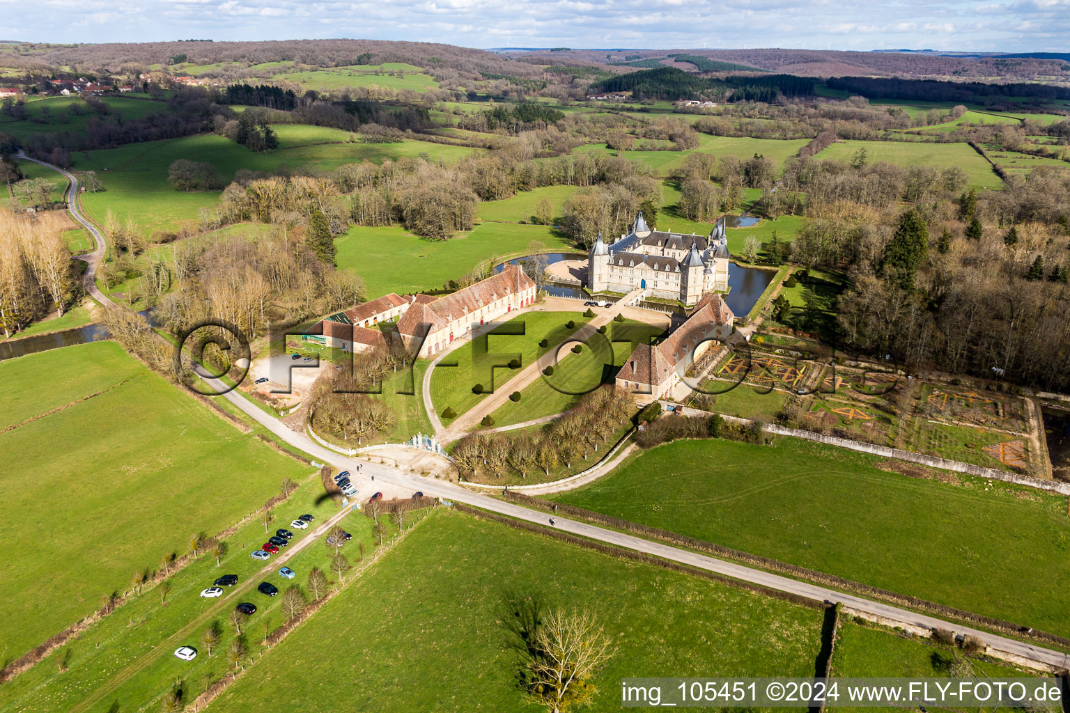 Bird's eye view of Water castle Château Sully in Burgundy in Sully in the state Saone et Loire, France