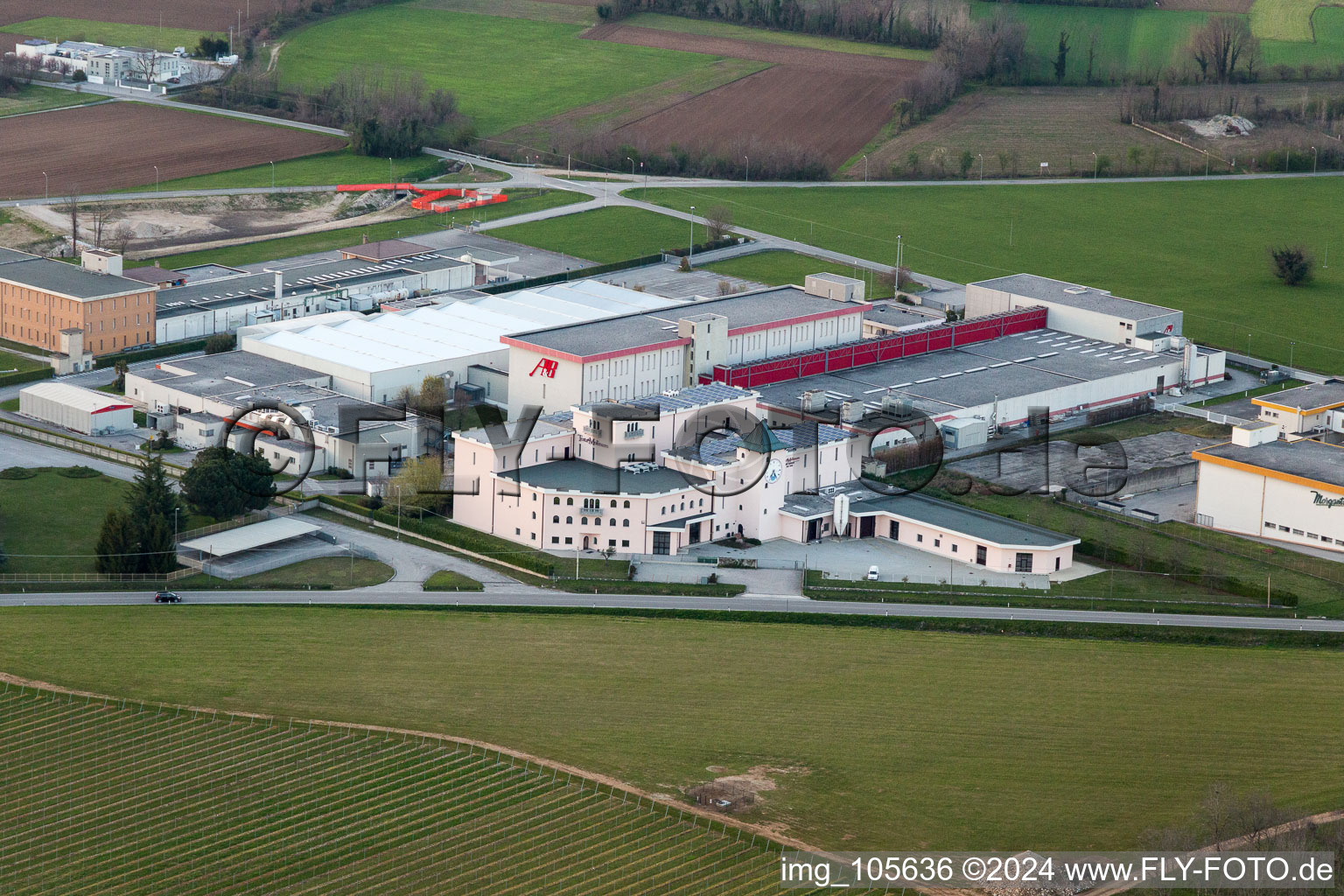 Aerial photograpy of Warehouse complex-building in the industrial area of Prosciuttificio Friulano und Leoncini Prosciutti in San Daniele del Friuli in Friuli-Venezia Giulia, Italy