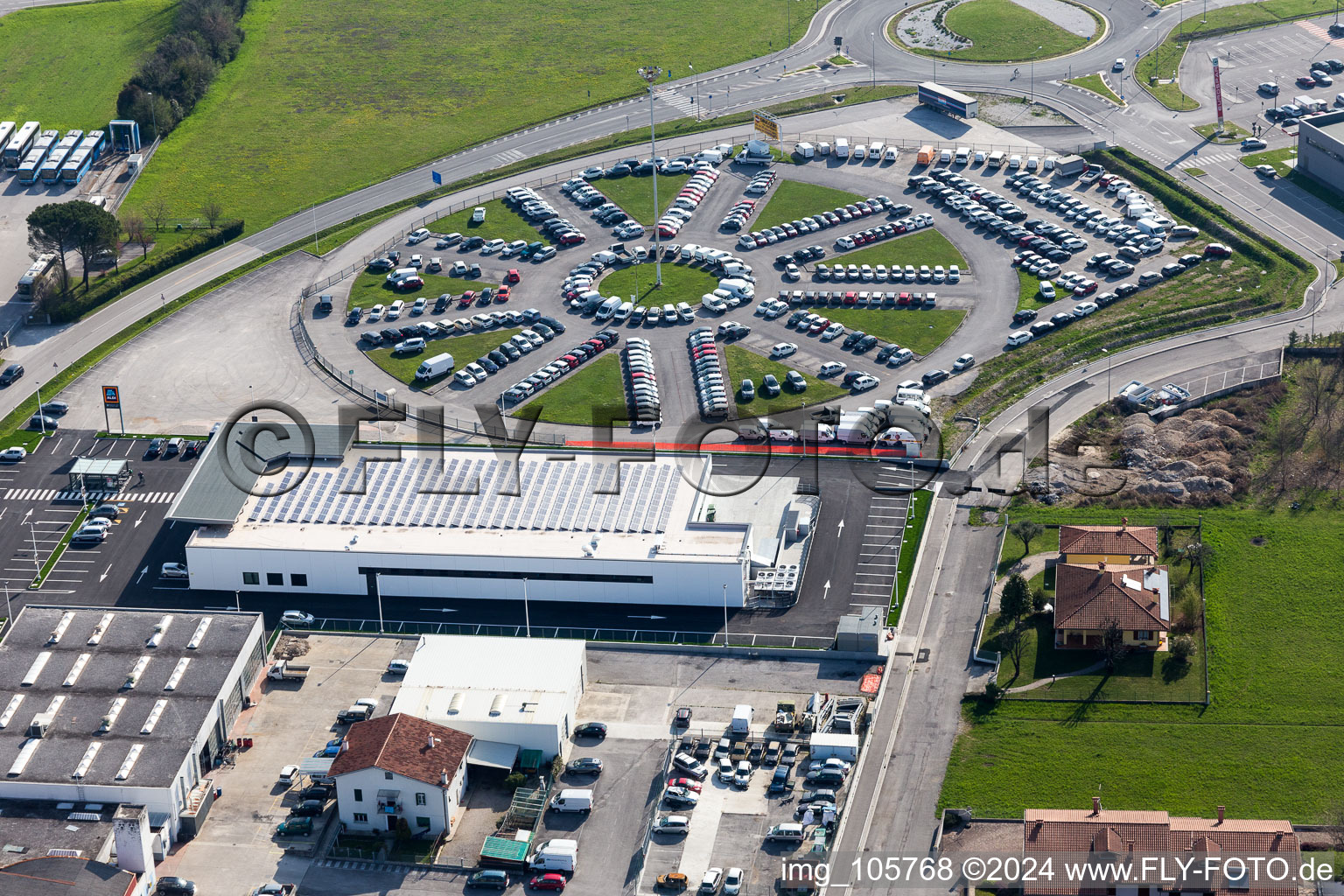 Store of the Supermarket Aldi and round parking place in Spilimbergo in Friuli-Venezia Giulia, Italy