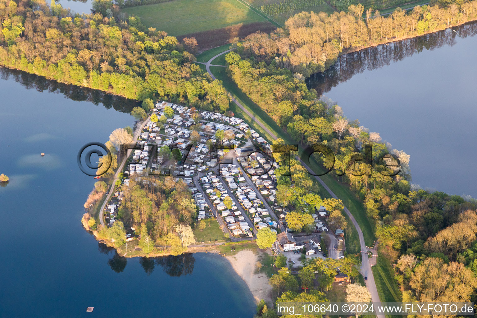 Quarry lake in Lingenfeld in the state Rhineland-Palatinate, Germany