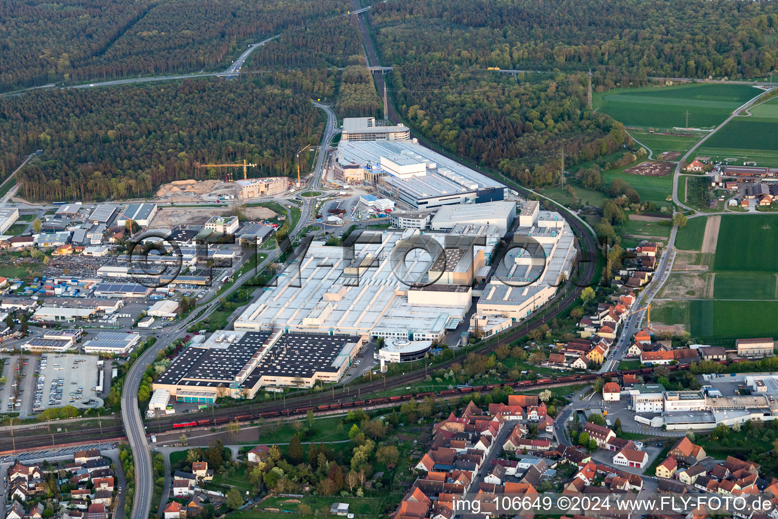 Bird's eye view of Extension - new building - construction site on the factory premises of SEW-EURODRIVE GmbH & Co KG in Graben-Neudorf in the state Baden-Wurttemberg, Germany